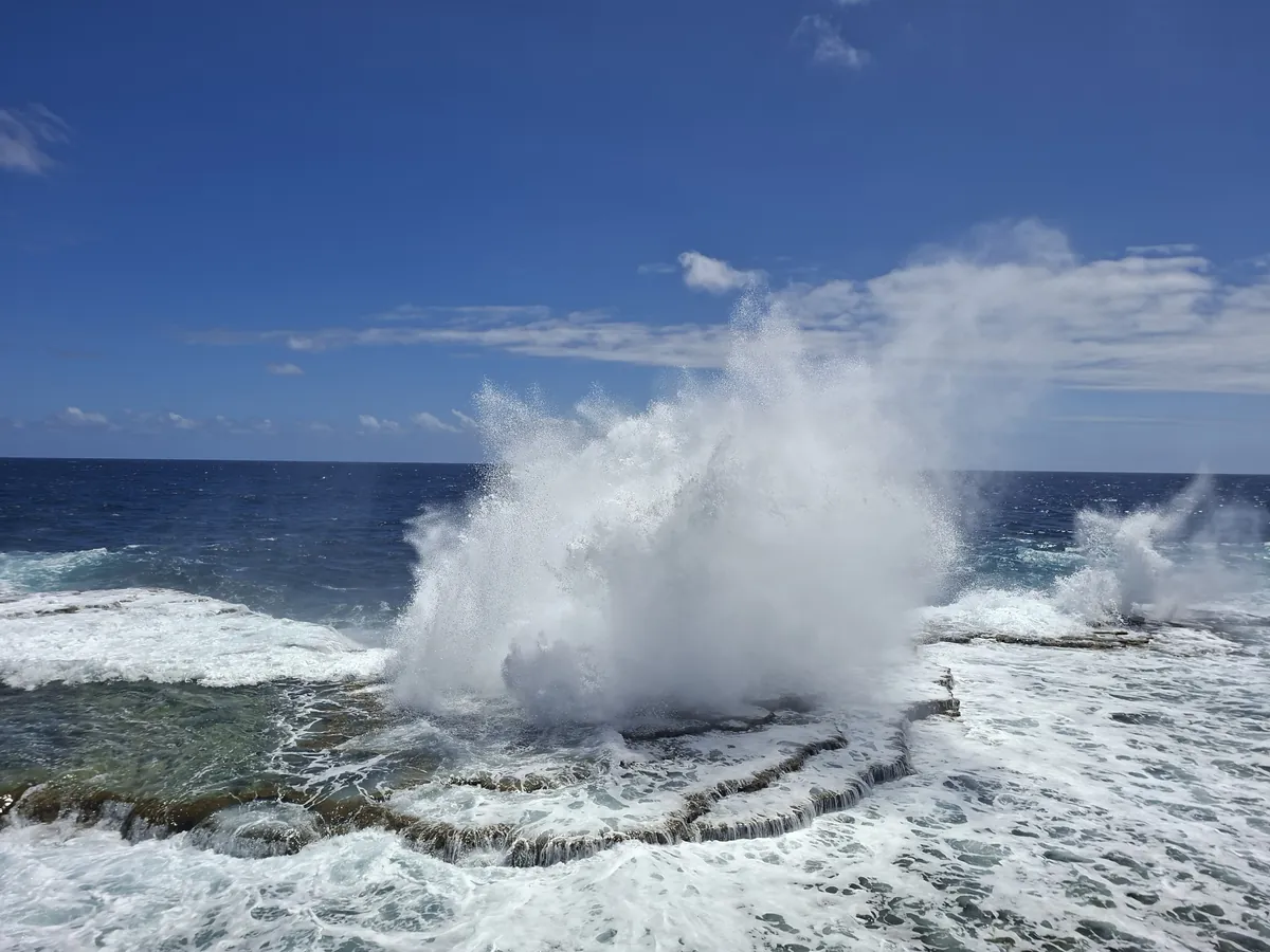 Ocean water spraying high over the Mapu 'a Vaea Blowholes